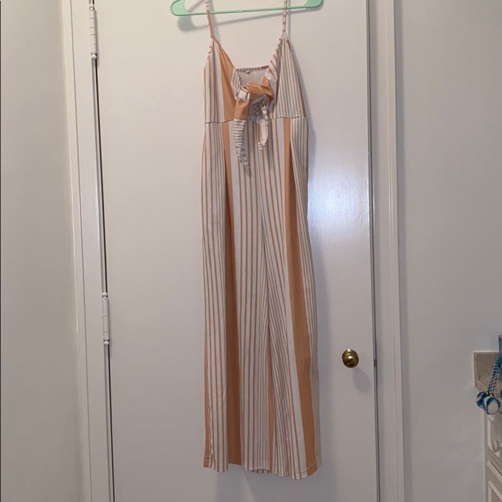 Yellow and white striped jumpsuit with front tie
